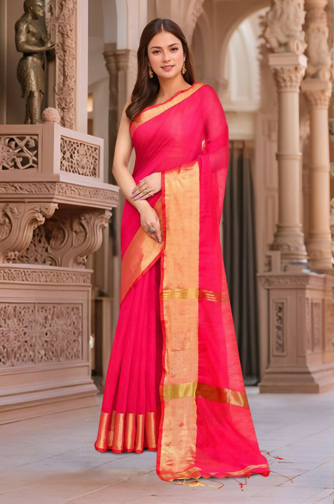 Woman wearing a trendy pink cotton saree with matching pink blouse