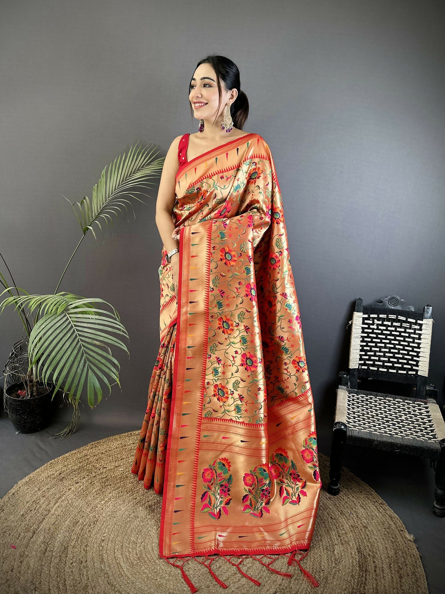 Light orange soft silk Paithani saree with peacock and floral woven motifs