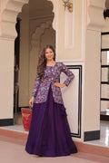 Woman wearing a purple Pure Simmer Vichitra lehenga with intricate kali pattern and canvas patta border