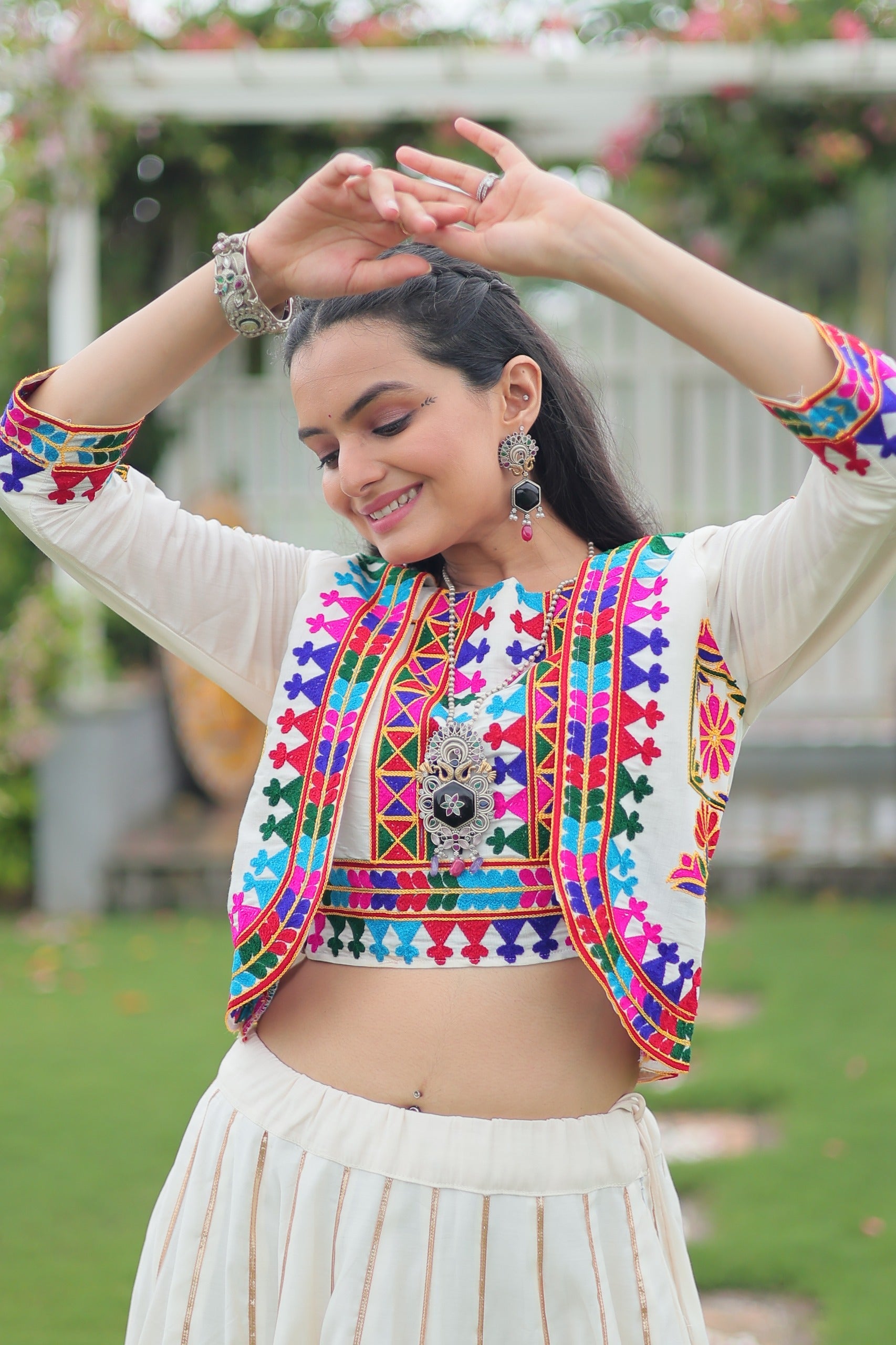 Off White Roman Silk Kutchi Embroidered Navratri Lehenga Set