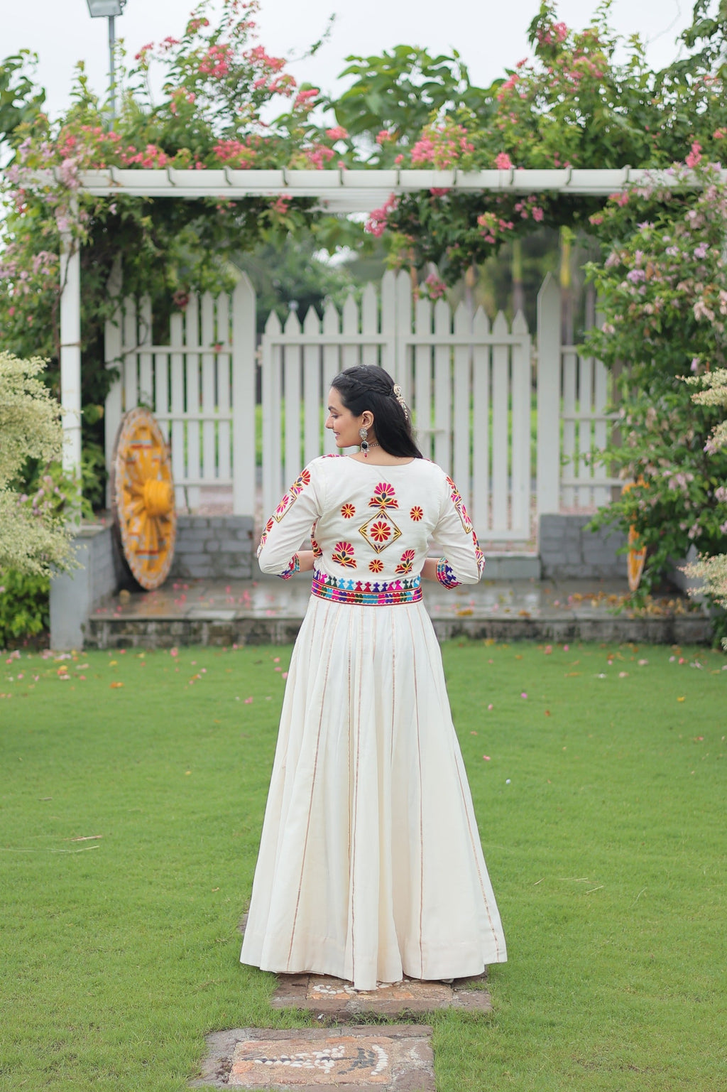 Off White Roman Silk Kutchi Embroidered Navratri Lehenga Set