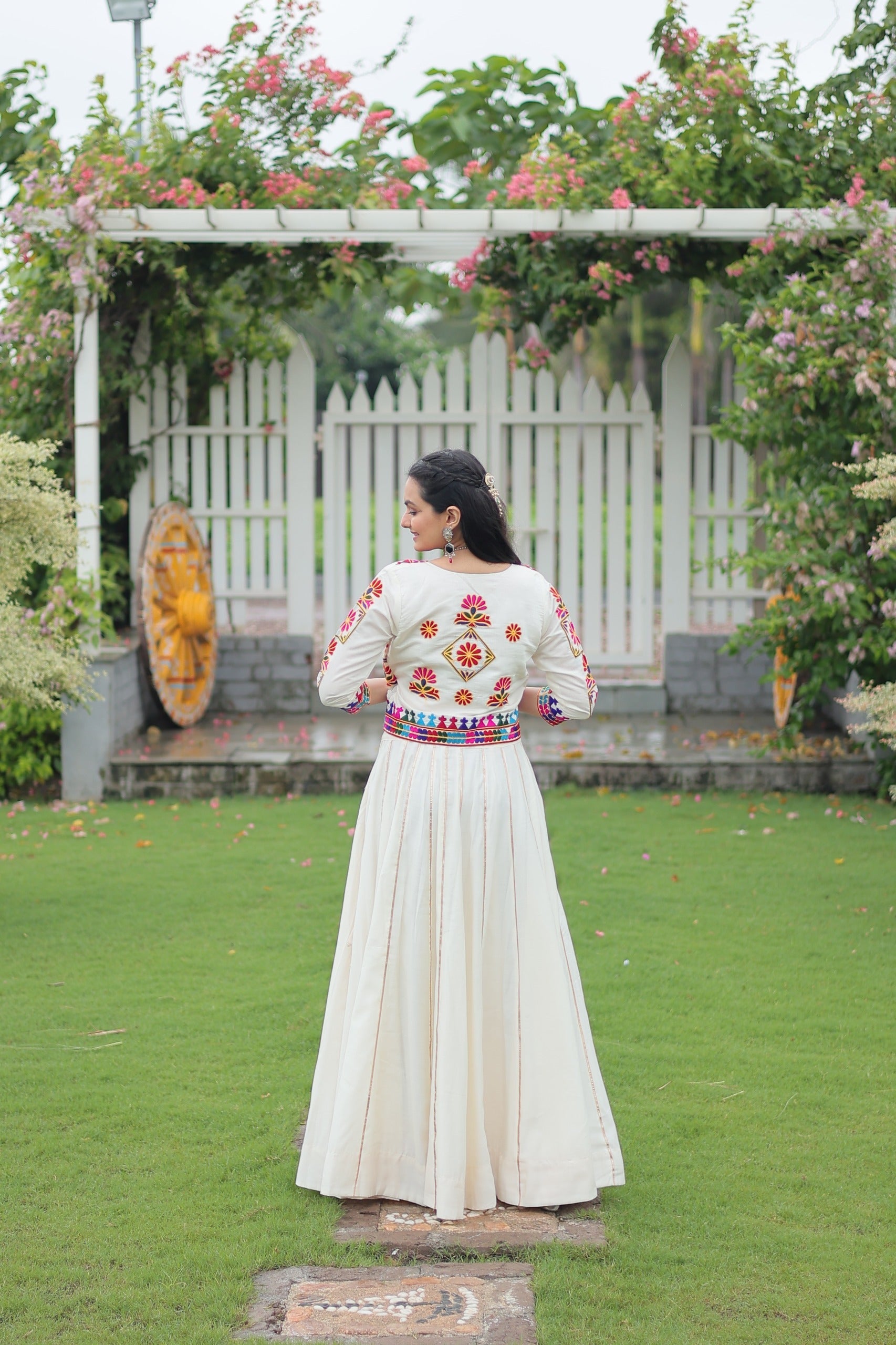 Off White Roman Silk Kutchi Embroidered Navratri Lehenga Set