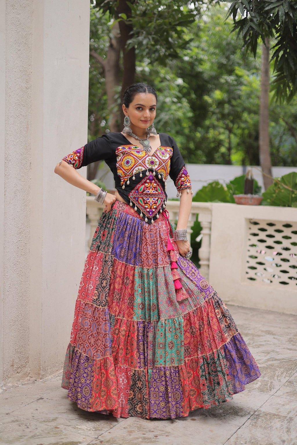 Black Kutchi Gamthi embroidered Navratri lehenga with Codi lace work