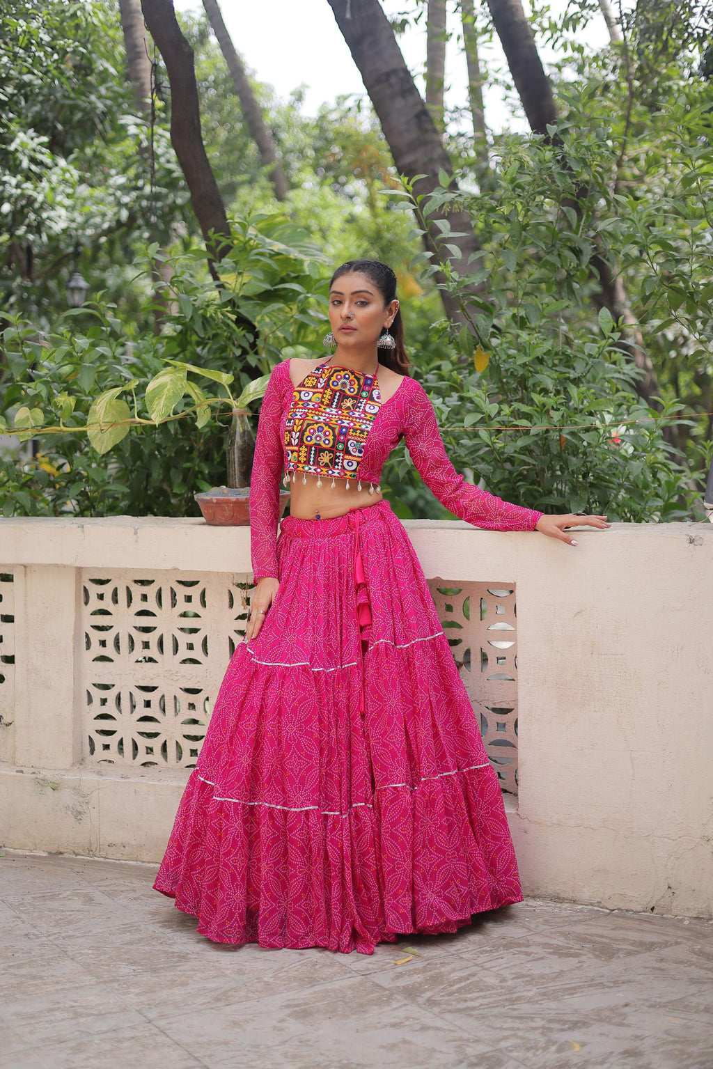 Pink faux georgette lehenga with traditional Bandhej print and Gota-Patti lace