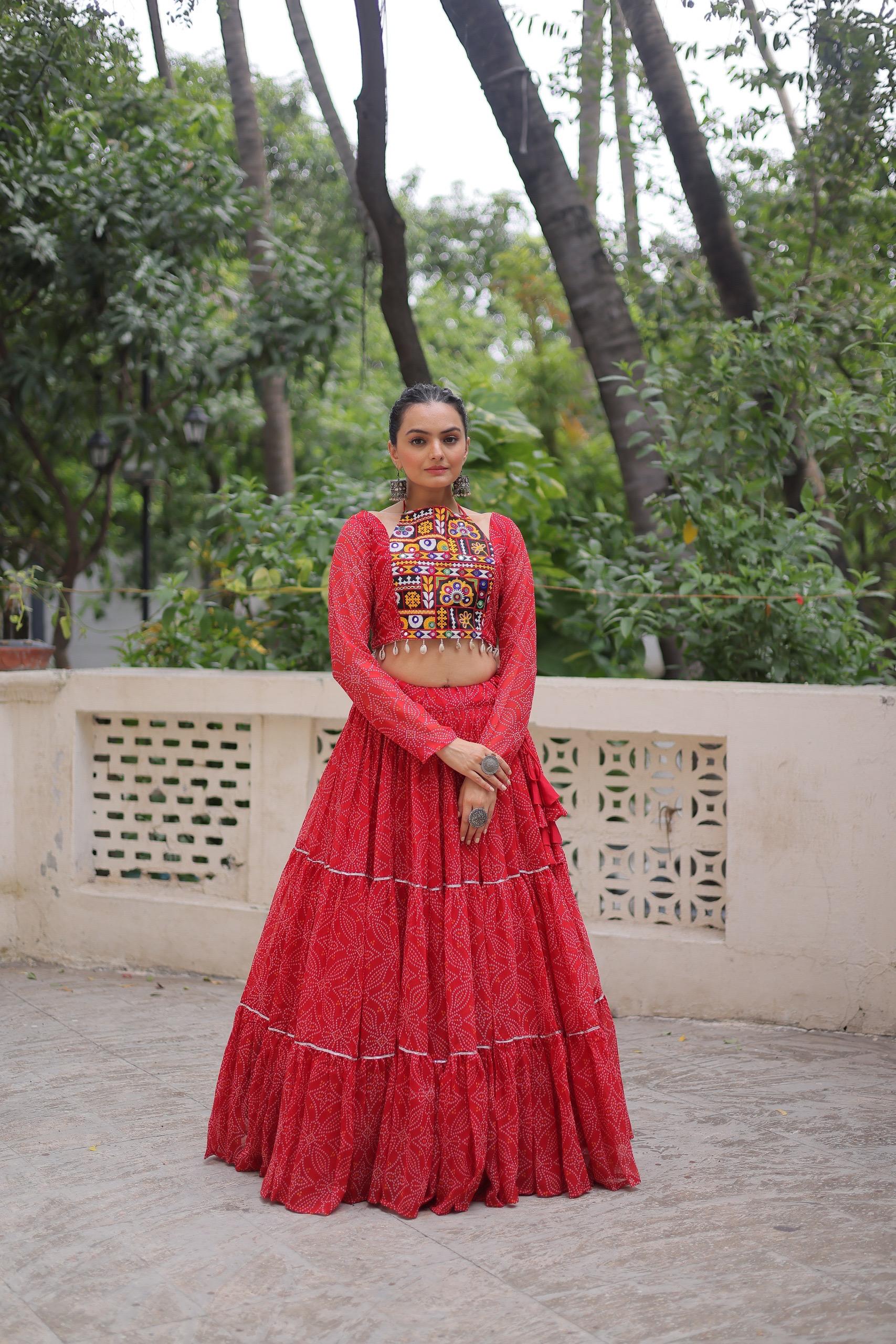 Red faux georgette lehenga featuring traditional Bandhej print and Gotta Patti lace detailing