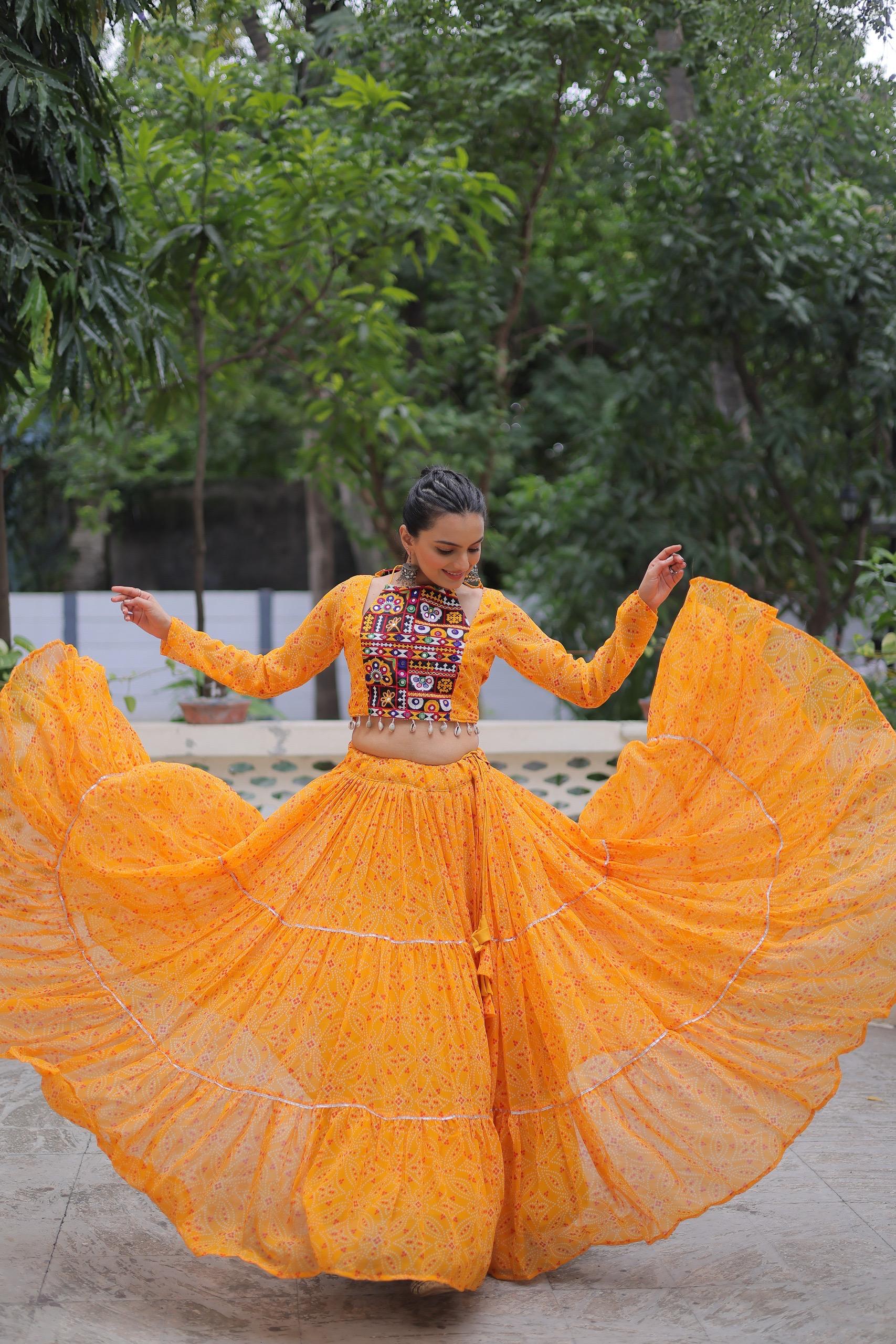 Yellow Georgette Bandhej print lehenga with detailed Gotta Patti lace