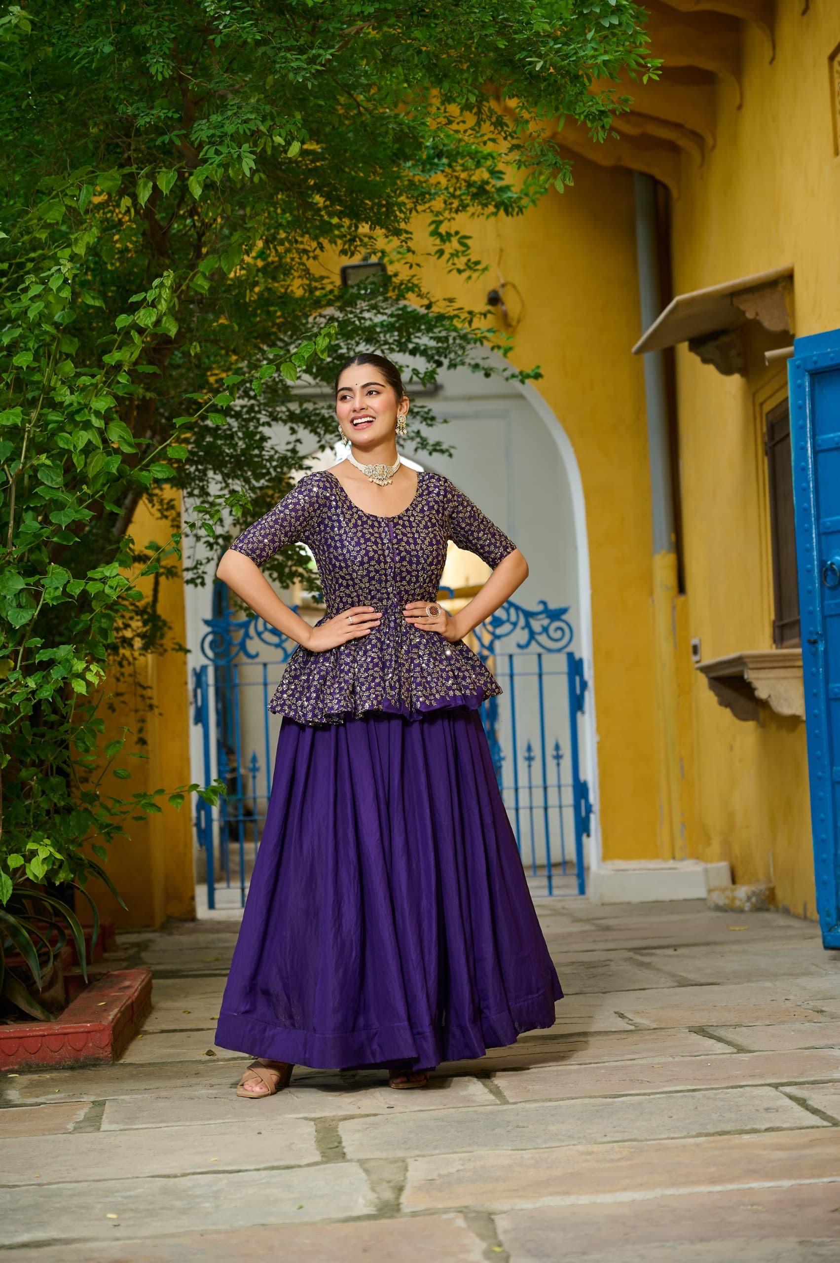 Violet Fendy silk designer lehenga with intricate embroidery work and a elegant flowy silhouette