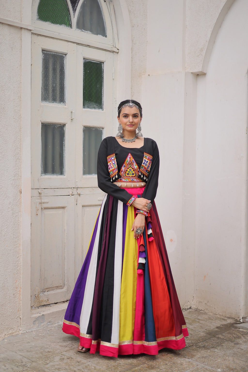 Black Roman fabric lehenga featuring traditional Gamthi embroidery and lace work