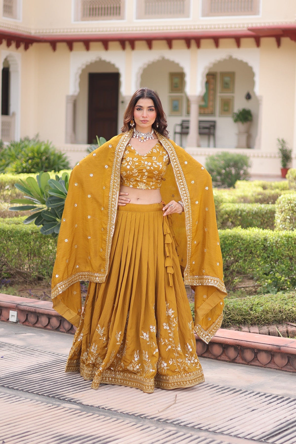 Mustard Vichitra Silk lehenga with heavy sequins and intricate zari embroidery