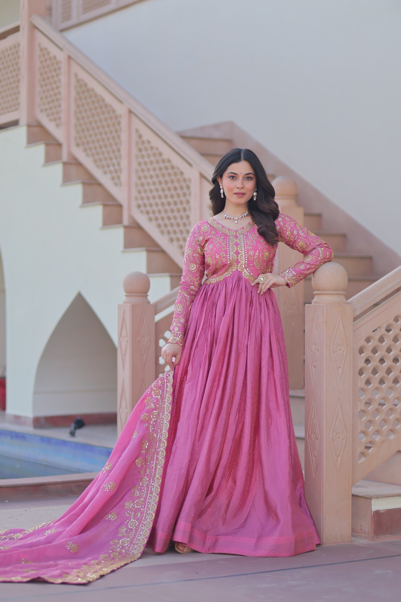 Light pink gold-crush gown with sequins and embroidered details, includes matching dupatta