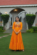 Vibrant yellow gown with Kutchi Gamthi embroidery, perfect for Navaratri celebrations