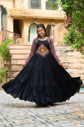 Black Rayon Navaratri gown with intricate Kutchi Gamthi embroidery and traditional print work.