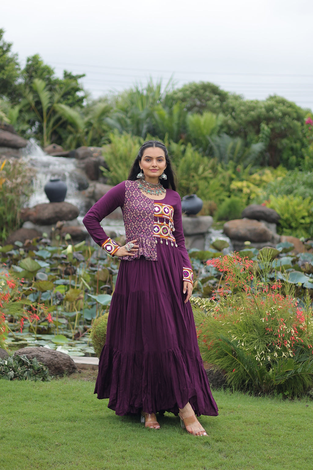 Wine colored Rayon gown featuring Kutchi Gamthi embroidery and cotton print accents