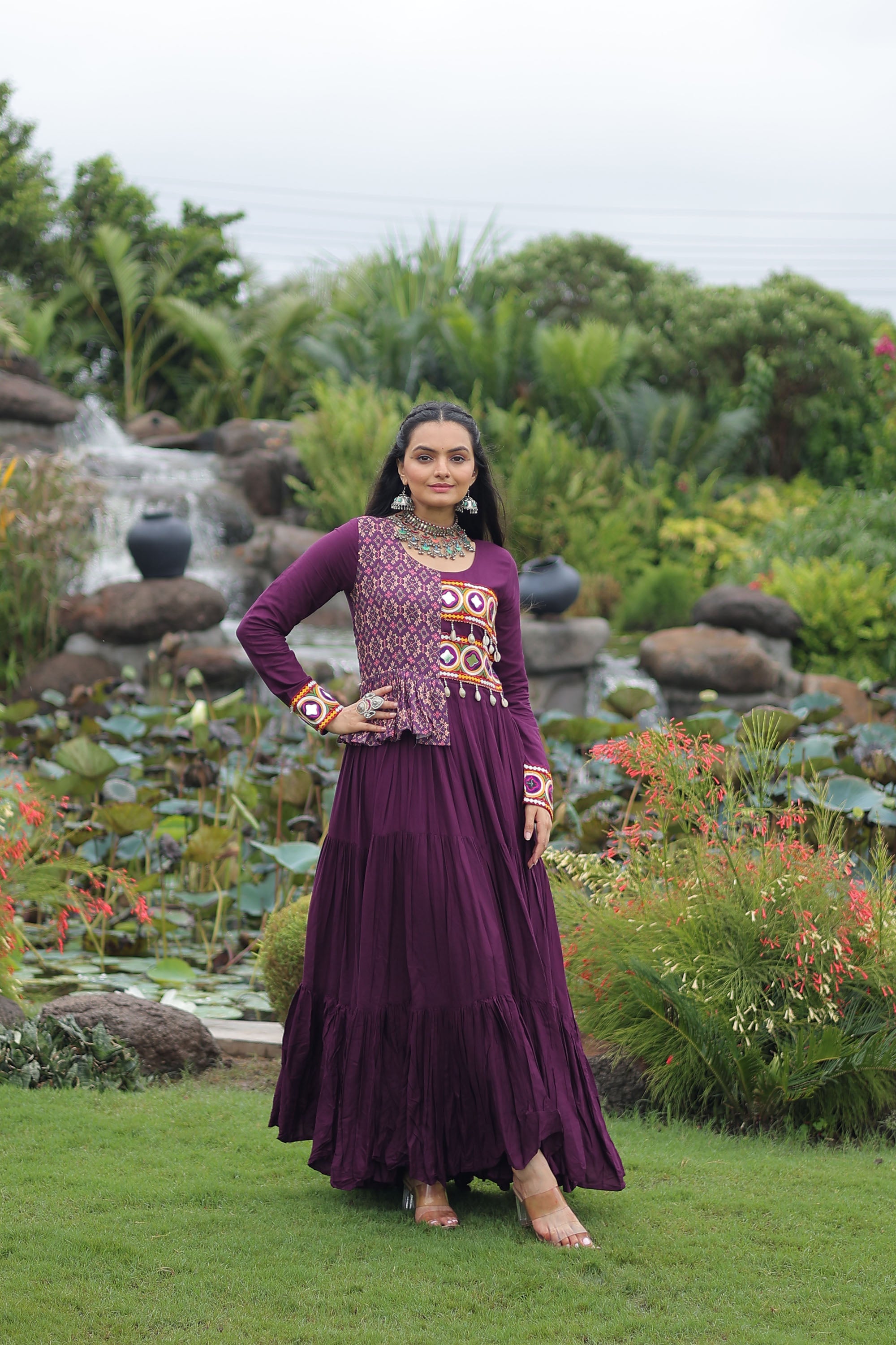 Wine colored Rayon gown featuring Kutchi Gamthi embroidery and cotton print accents
