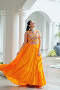 Yellow rayon gown with intricate thread embroidery and mirror work detailing