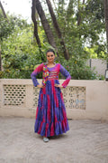Multicolor faux georgette gown featuring Laheriya, Bandhej print, and Kutchi patch work for Navratri