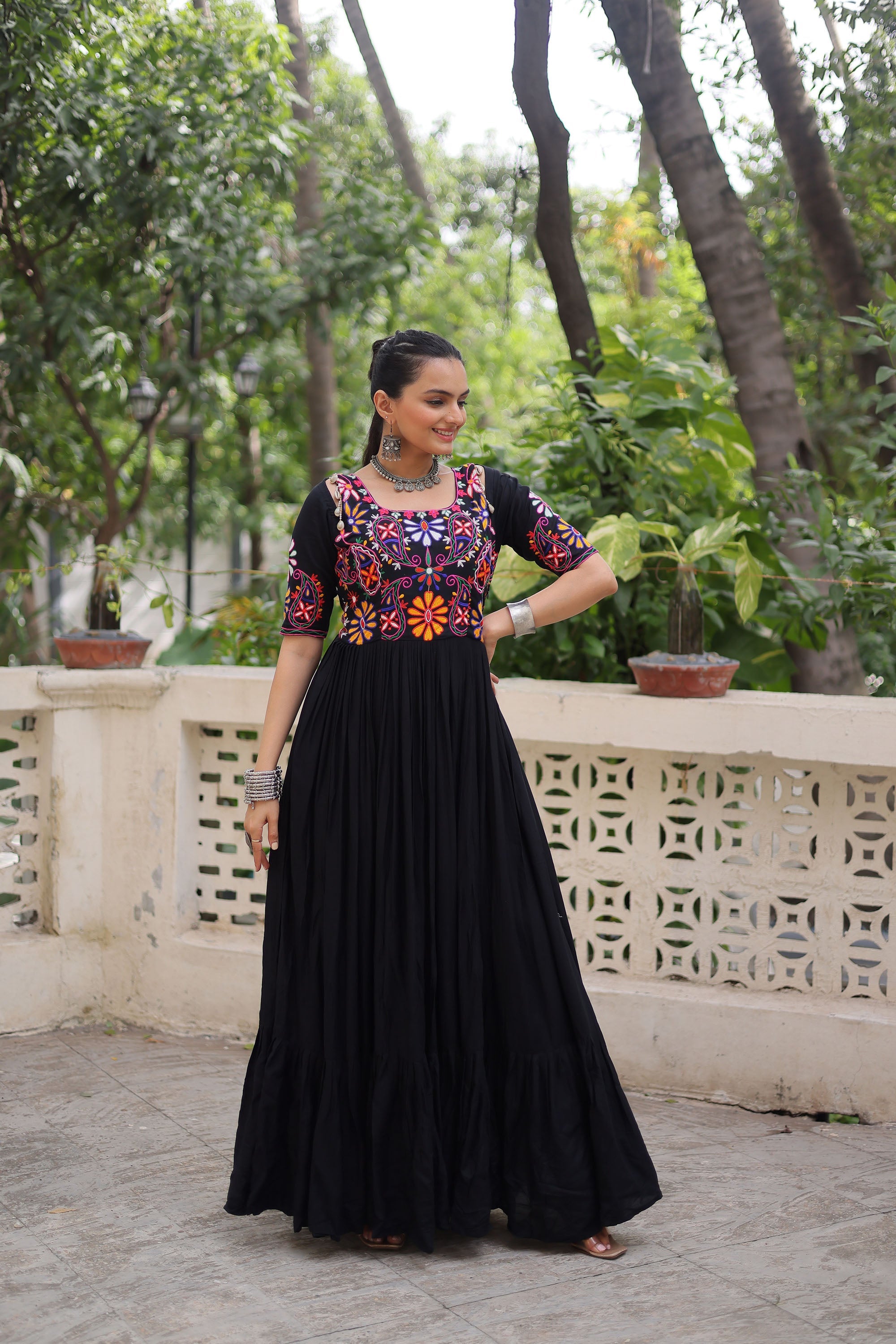 Black rayon ethnic gown featuring detailed Kutchi Gamthi embroidered thread work.