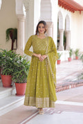 Mahendi green georgette gown with heavy sequins and zari embroidery