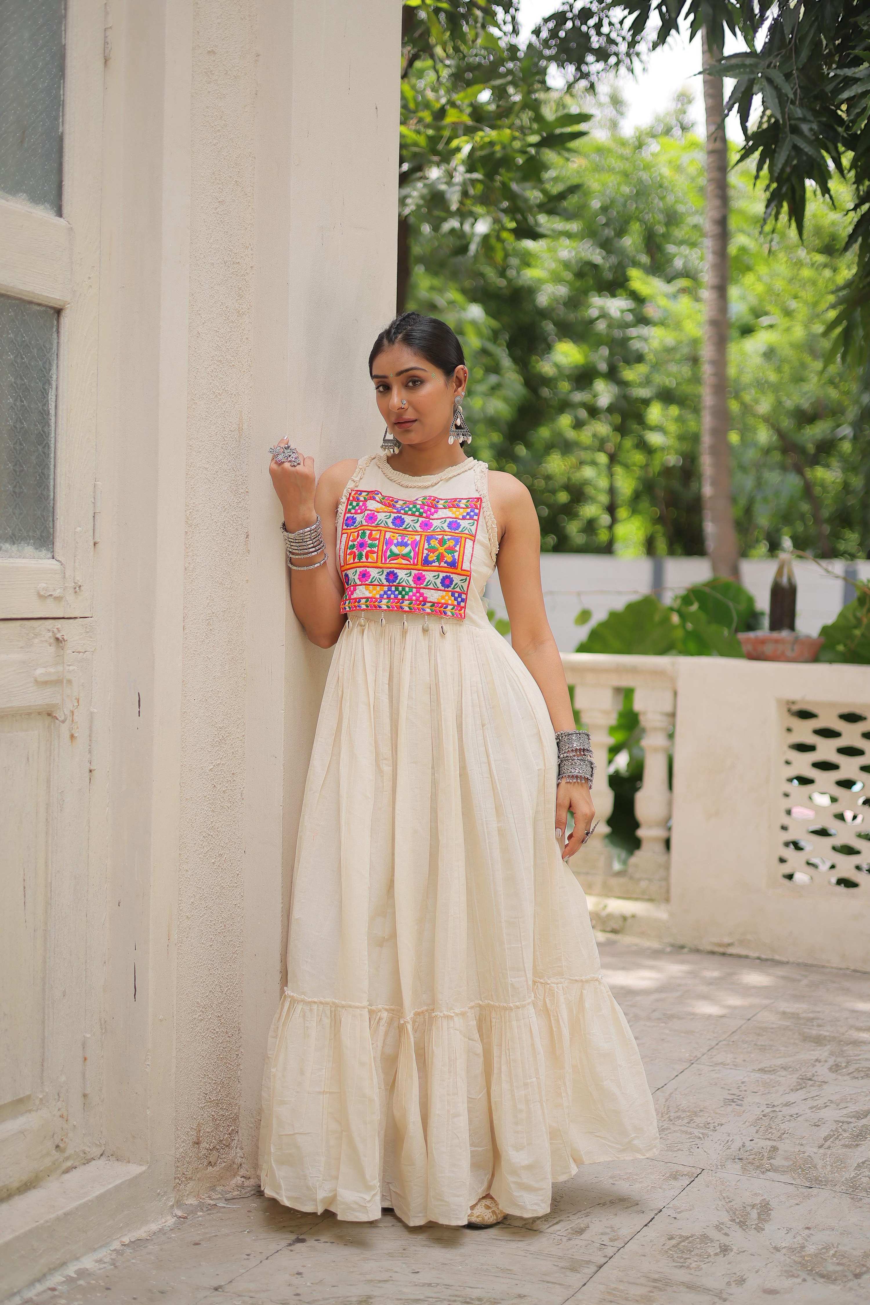 Off white kora cotton gown with heavy multi-thread embroidery