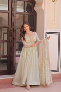 Pistachio green floor-length georgette gown with gold sequin embroidery and dupatta