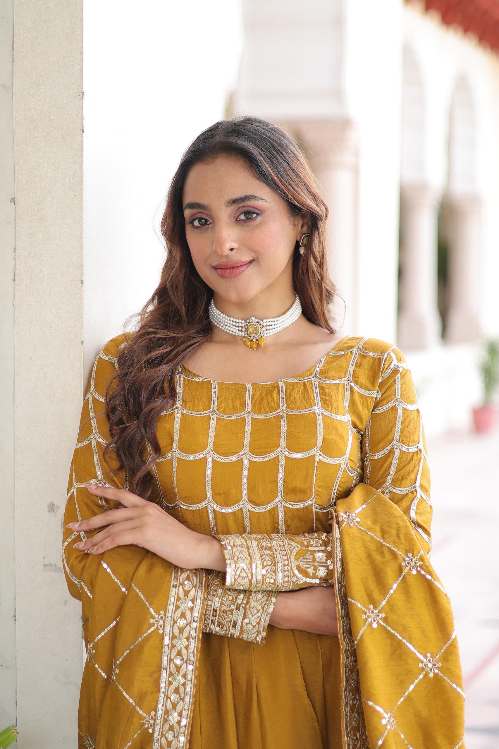 Prazu Fashion Mustard Vichitra Silk Rich Sequins & Zari Embroidered Gown With Dupatta