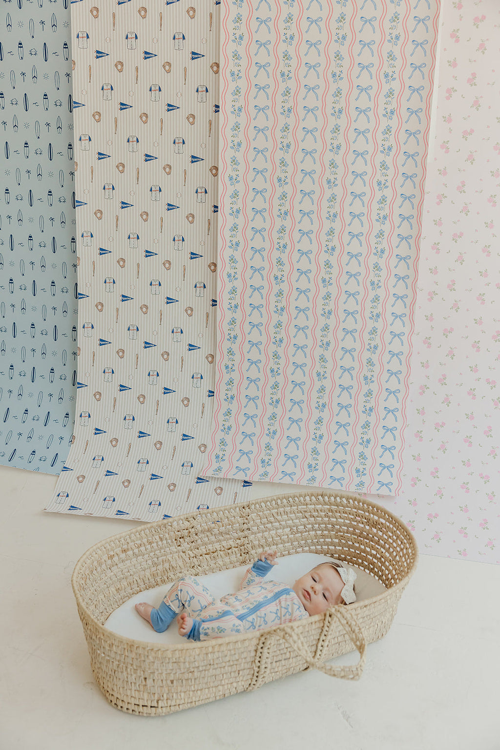 Amelia Bow Whimsical Nursery Wallpaper in Pink and Blue