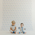 Blue Baseball patterned peel and stick wallpaper for a sports-themed nursery