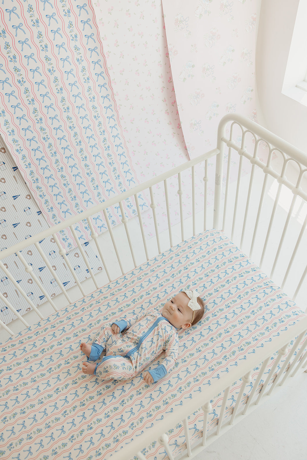 Amelia Bow Whimsical Nursery Wallpaper in Pink and Blue
