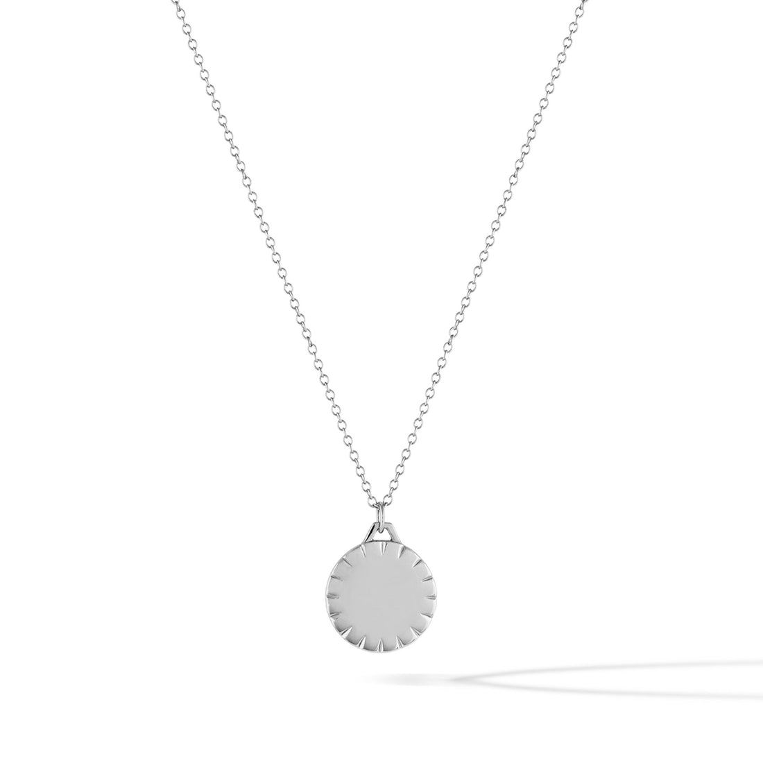 Horizon Pendant in rhodium-plated sterling silver on a minimalist chain.