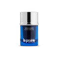 La Prairie Skin Caviar Nighttime Oil in a deep cobalt blue bottle with silver accents.