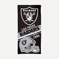 Las Vegas Raiders velour beach towel featuring team helmet and logo on black background