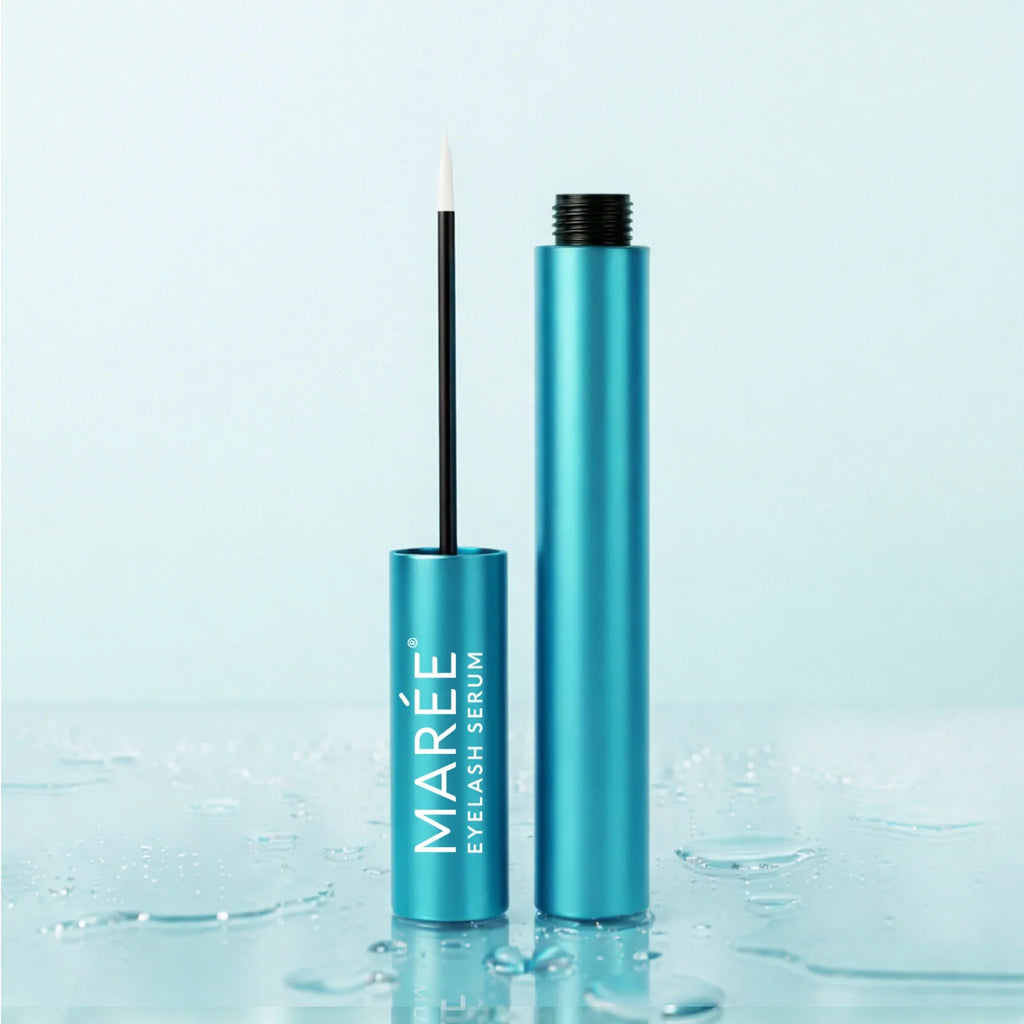 Maree eyelash and eyebrow growth serum bottle with applicator brush.