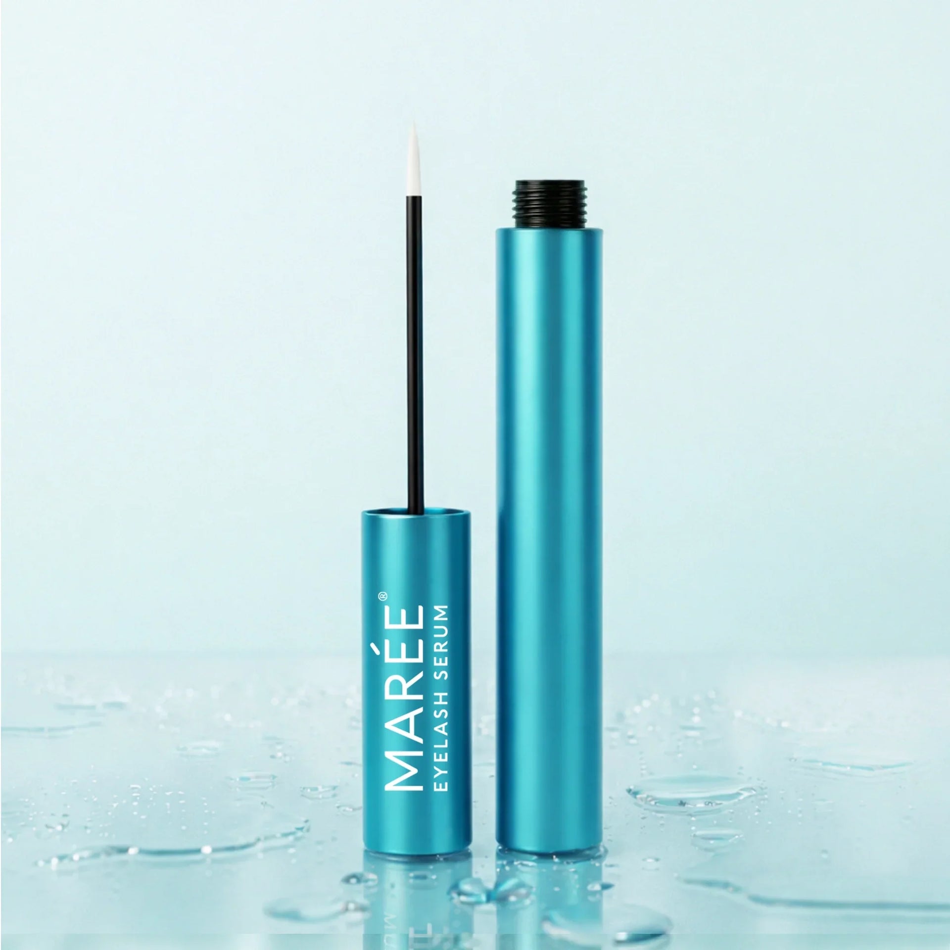 Maree eyelash and eyebrow growth serum bottle with applicator brush.