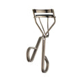 Gunmetal Artist Eyelash Curler for achieving a wide-eyed lash look.