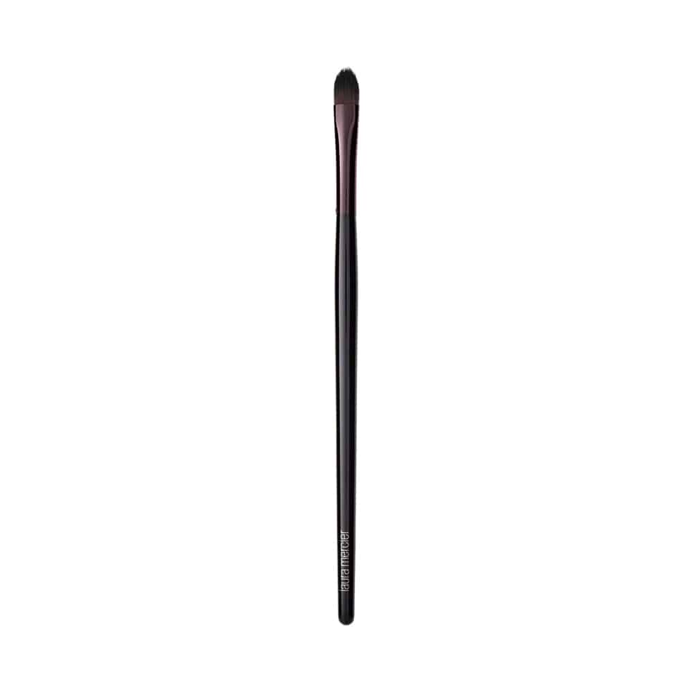 Laura Mercier Crème Eye Detail Brush with a pointed tip for precise makeup application