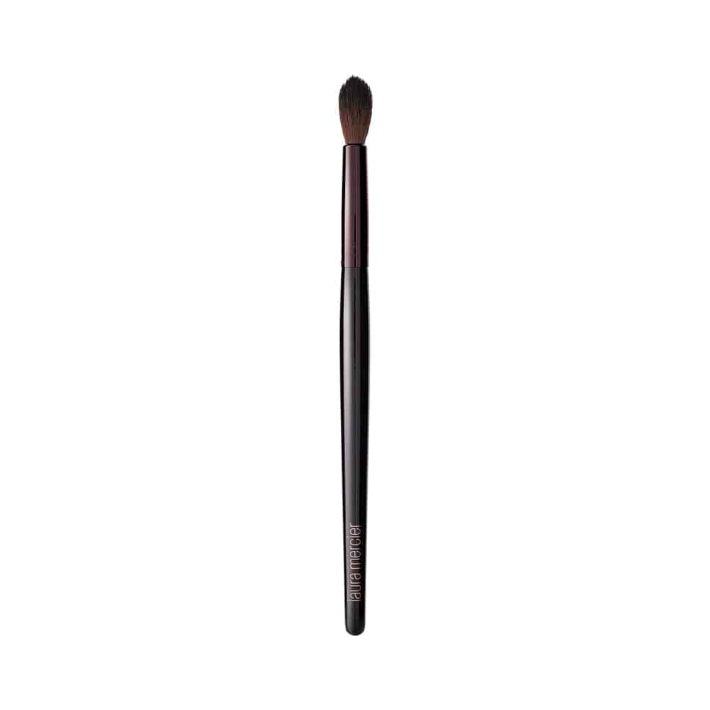 Laura Mercier professional finishing pony tail makeup brush with black handle.