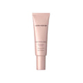 Laura Mercier Pure Canvas Primer Illuminating in pink packaging.