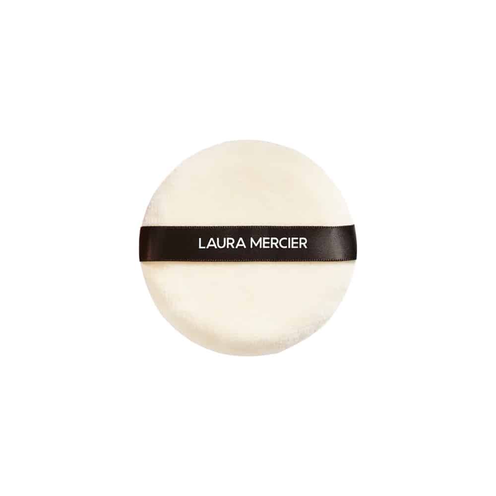 White and brown velour powder puff designed for professional makeup setting.