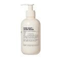 Le Labo Hinoki Hand Soap bottle with minimalist off-white and black labeling.