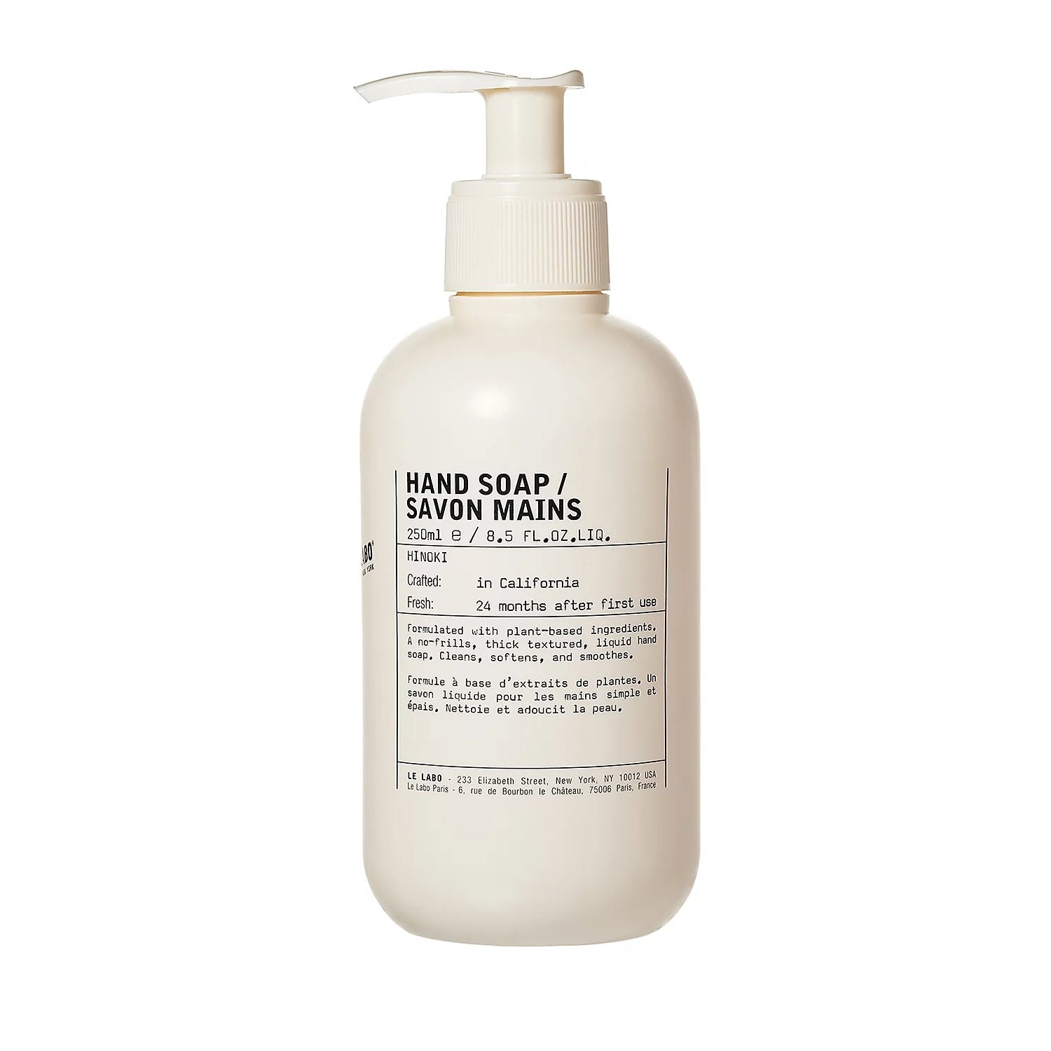 Le Labo Hinoki Hand Soap bottle with minimalist off-white and black labeling.