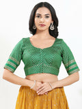 Elegant green brocade padded blouse with round neck and elbow-length sleeves