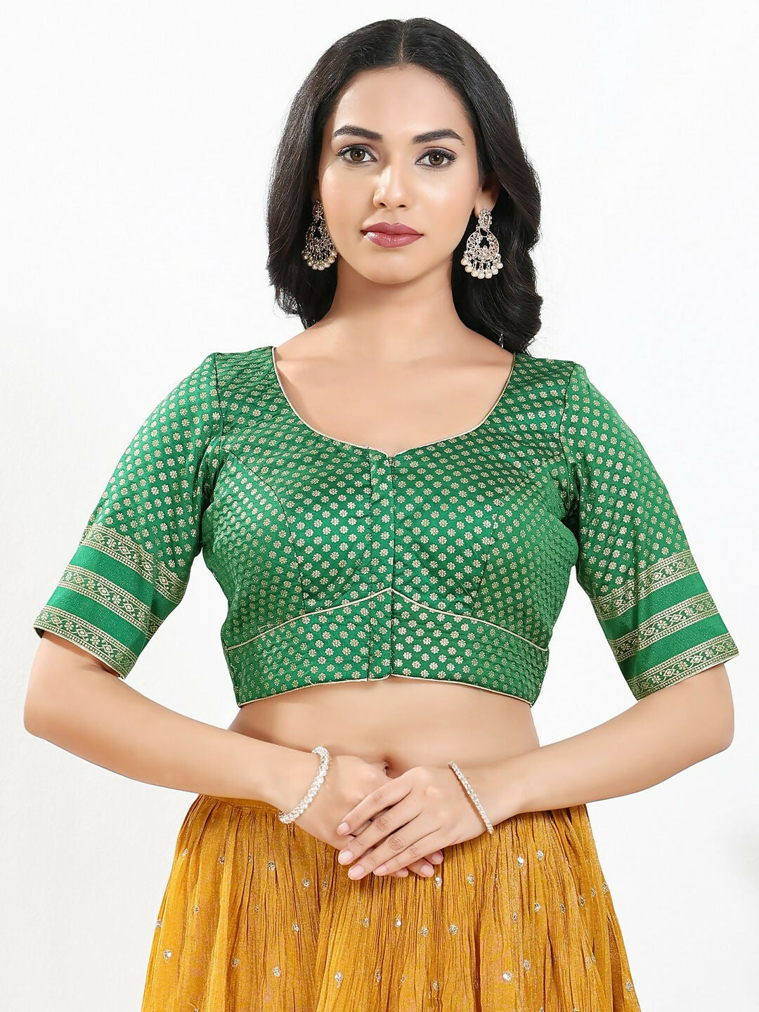 Elegant green brocade padded blouse with round neck and elbow-length sleeves