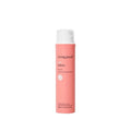 Living Proof Curl Definer conditioning styler in a coral and white bottle, 6.4 fl oz.
