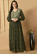 Woman wearing a vibrant green Chinnon kurta set, 2-piece ethnic outfit.