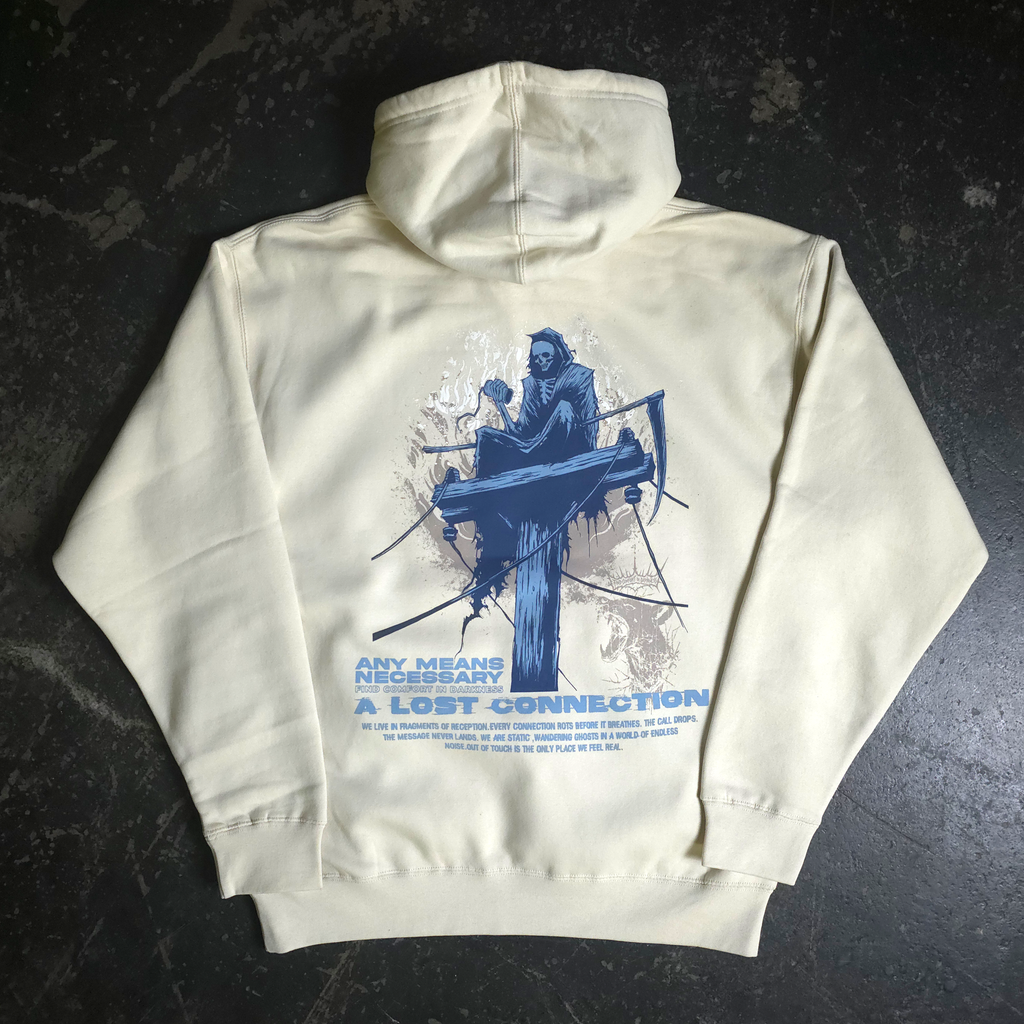 Back view of the cream-colored Lost Connection pullover hoodie with a detailed graphic of a reaper on a utility pole.