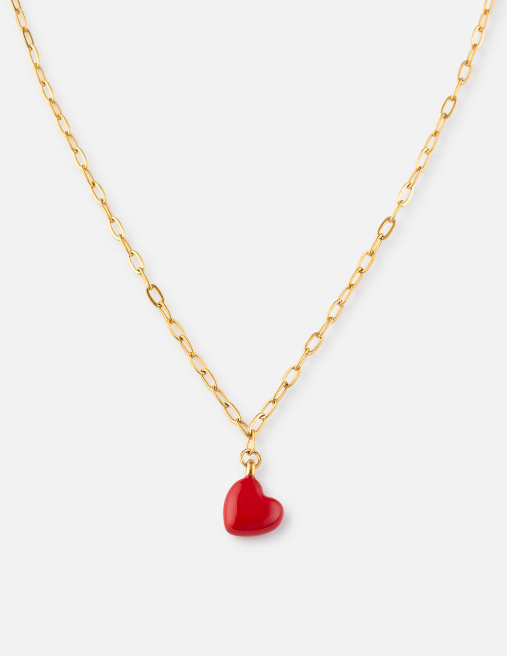 Love Paperclip Chain Necklace in gold with a vibrant red heart charm against a minimalist background