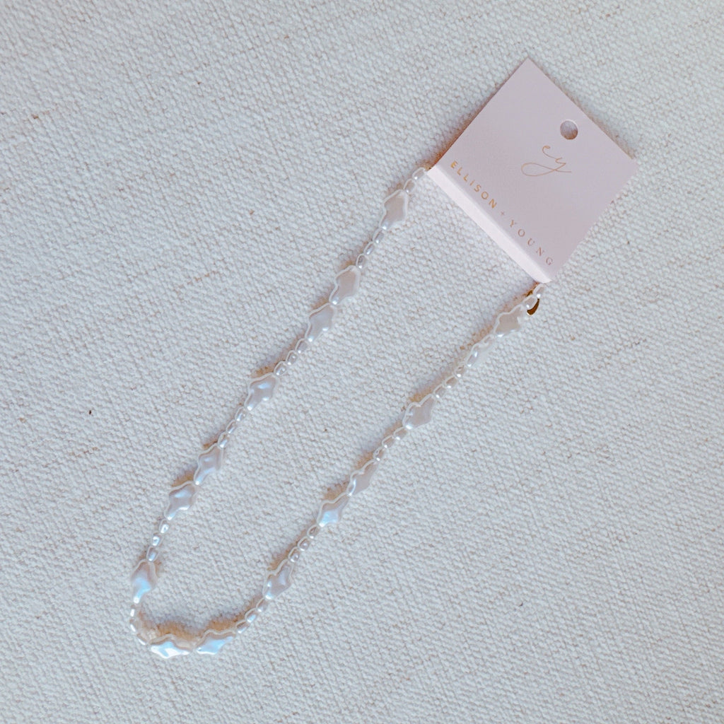 Luminous Pearl Cross Necklace