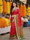 Red Pochampally silk saree with traditional geometric weave and matching fabric.
