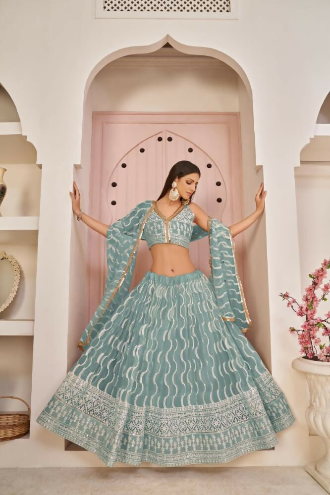 Ocean Blue Butterfly Net lehenga with white thread work and zari embroidery