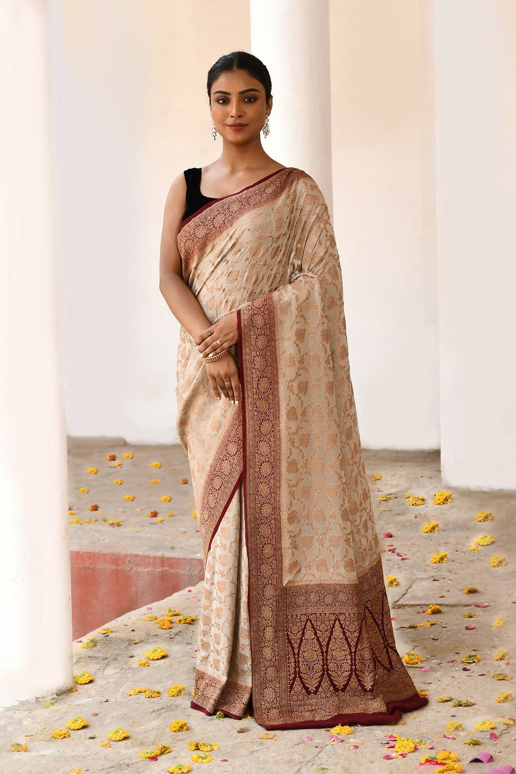 Crème colored pure handloom Banarasi silk saree in crepe chiffon fabric.